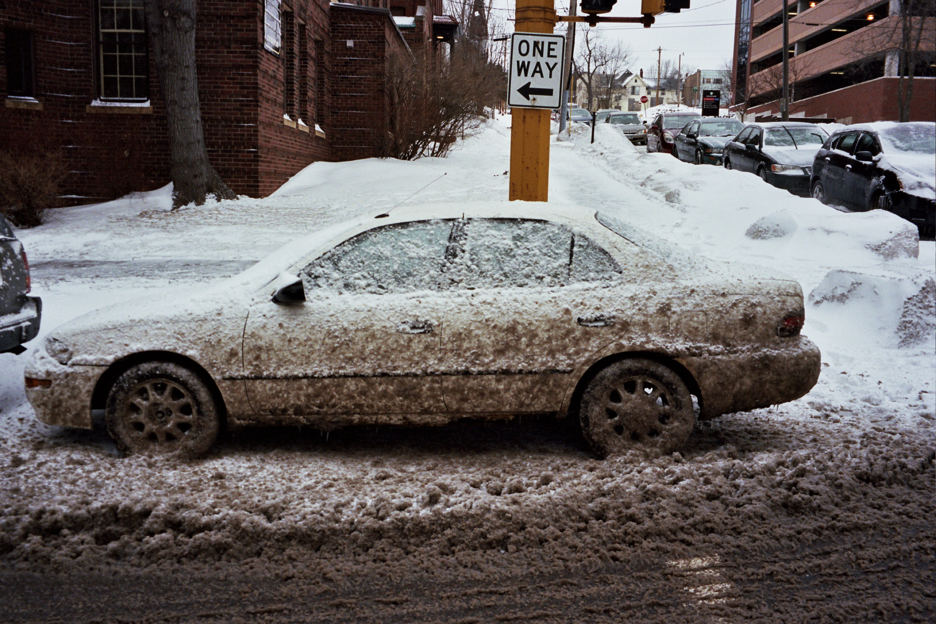 Snow Smattered Car